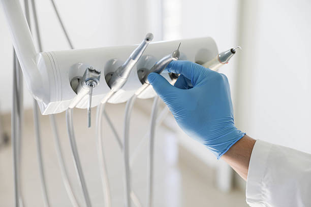 Professional Dental Implants technician working in Okmulgee, OK